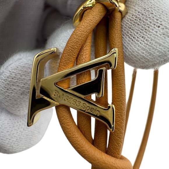 LOUIS VUITTON Brown Charm Bracelet - Picture 8 of 9